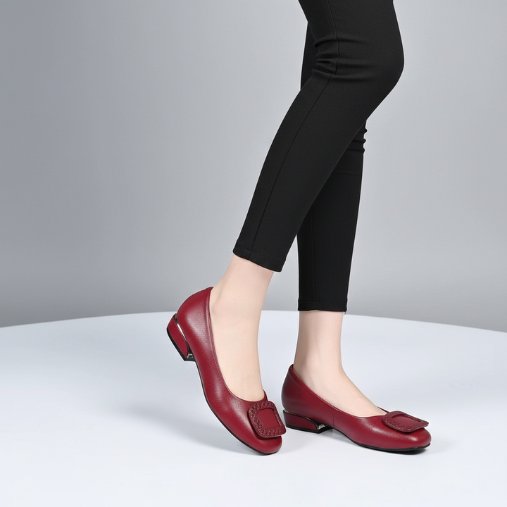 Women's black leather orthopedic flats with supportive low heel for all-day comfort