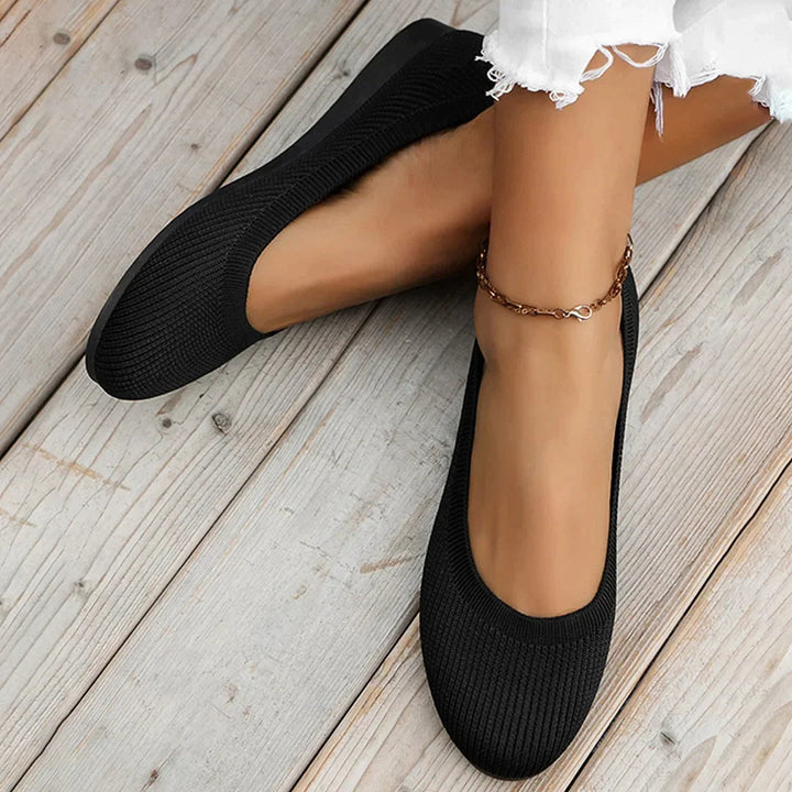 Orthopedic black loafers for women, offering superior comfort and all-day arch and heel support.
