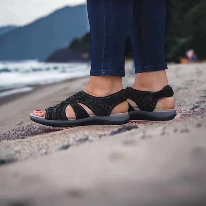 Women's comfortable walking sandals, orthopedic design for arch support. Adjustable summer footwear with stylish crisscross straps.