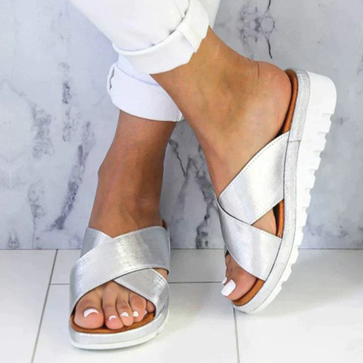 Stylish slip-on women's summer sandals, perfect for casual wear and walking with arch support.