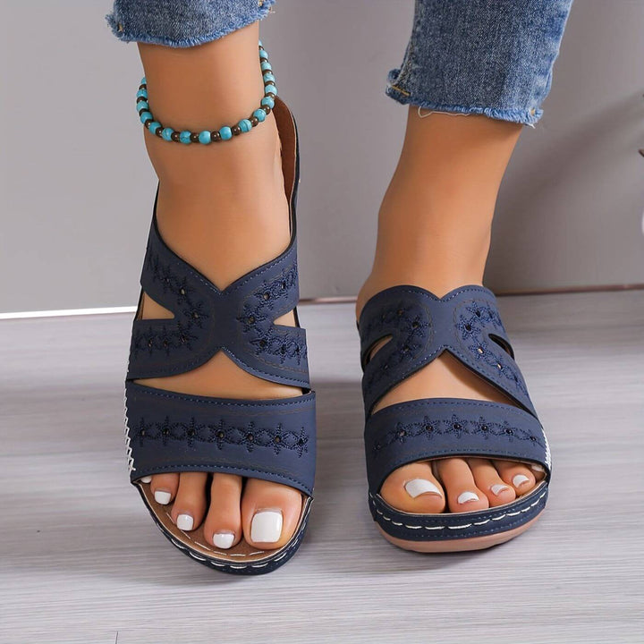 Orthopedic women's footwear with arch support, providing foot pain relief & comfort for walking.