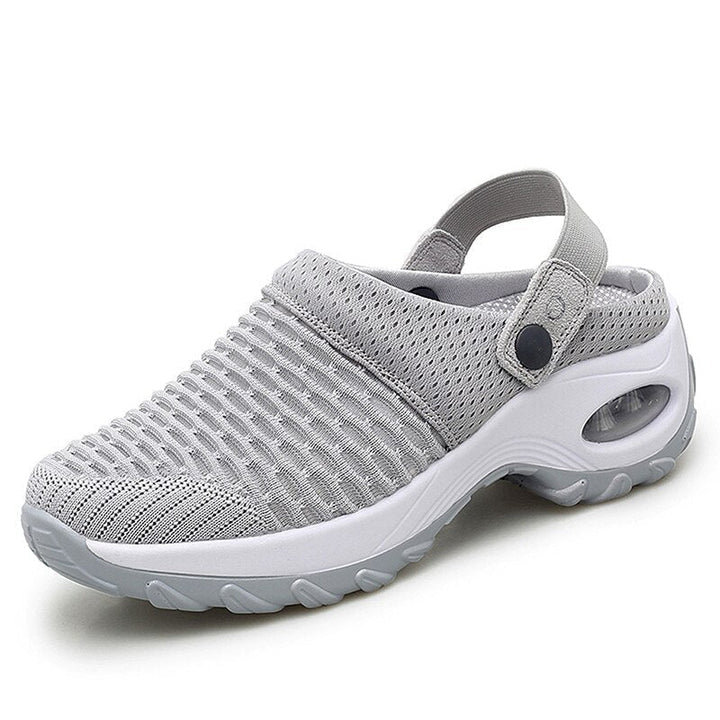 Supportive women's orthopedic sandals, ideal for arch support & breathable comfort on walks.