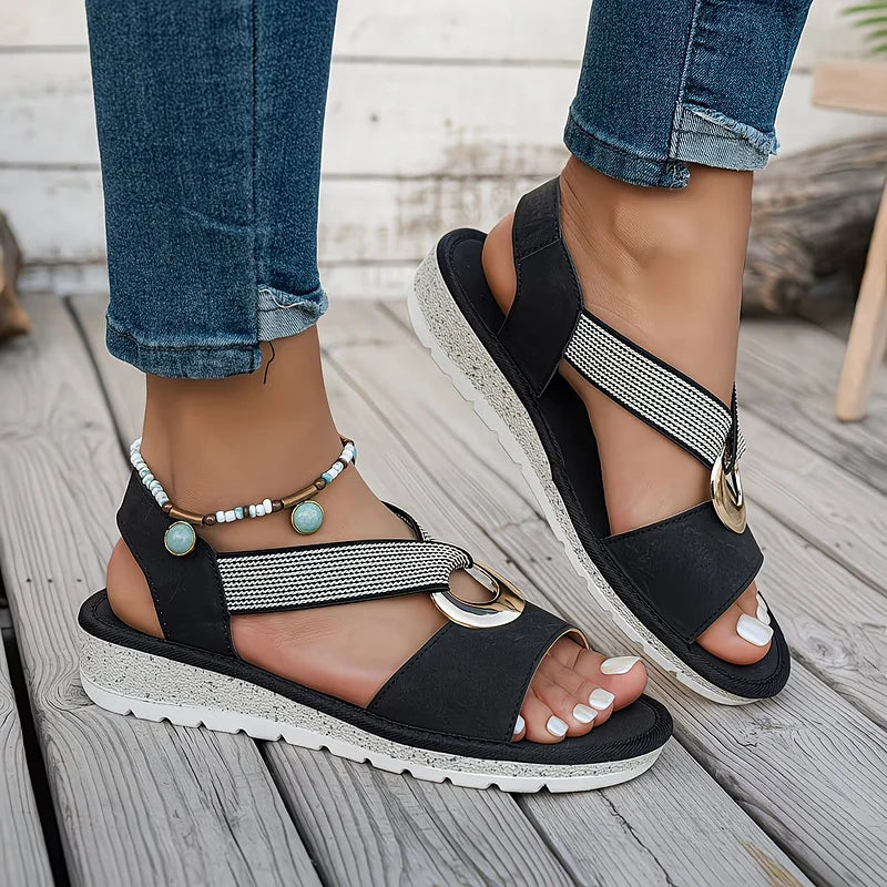 Stay comfortable in women's orthopedic summer sandals. Feature stretch strap & supportive arch for daily wear.