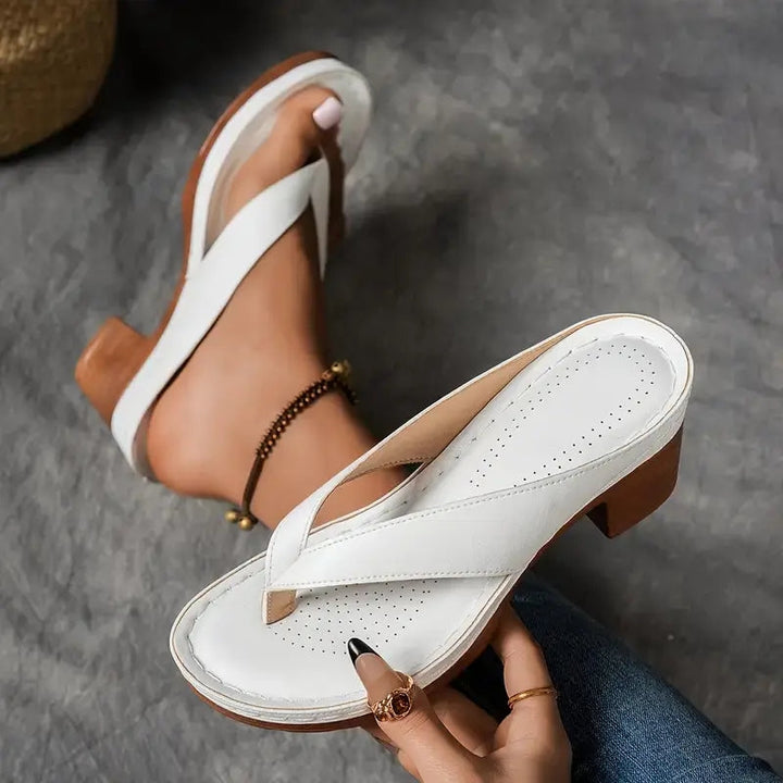 Stylish women's slip-on sandals, offering orthopedic arch support and all-day comfort.