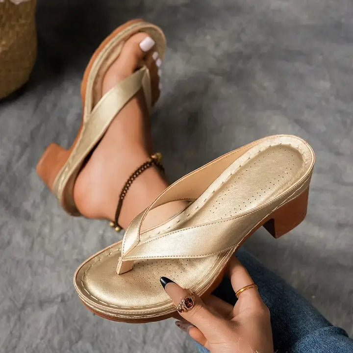 Slip-on orthopedic sandals for women, designed for comfort and arch support with a stylish chunky heel.