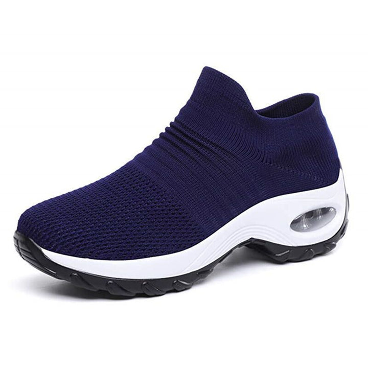 Comfortable women's orthopedic footwear with arch support for daily wear & pain relief.