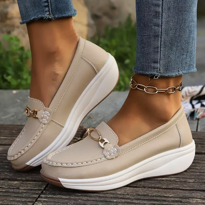 Supportive women's slip-on loafers provide orthopedic comfort & arch support for all-day walking.