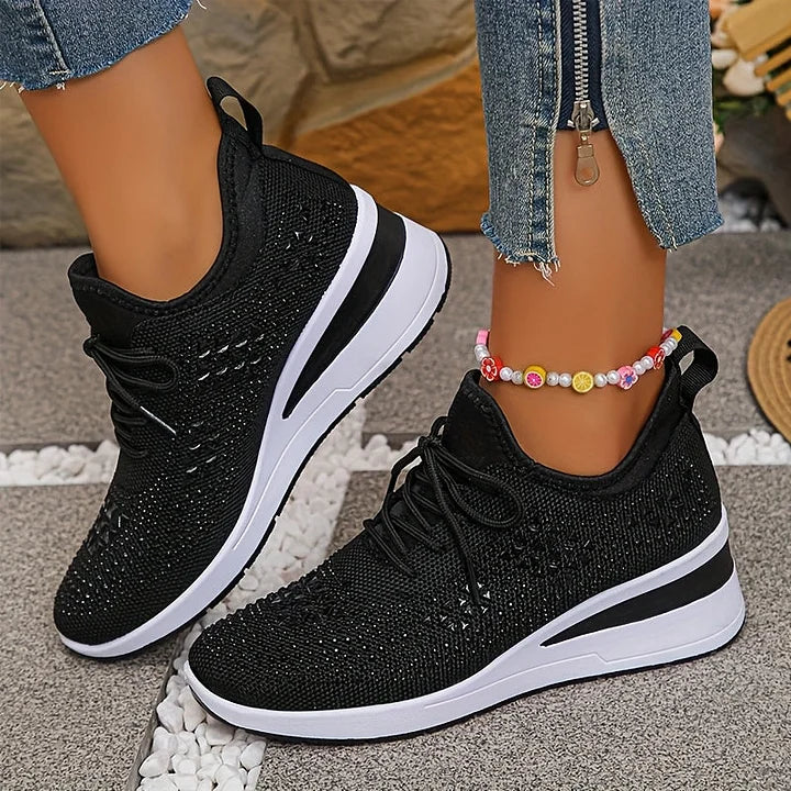 Lightweight women's orthopedic athletic shoes, providing supreme comfort and subtle sparkle.