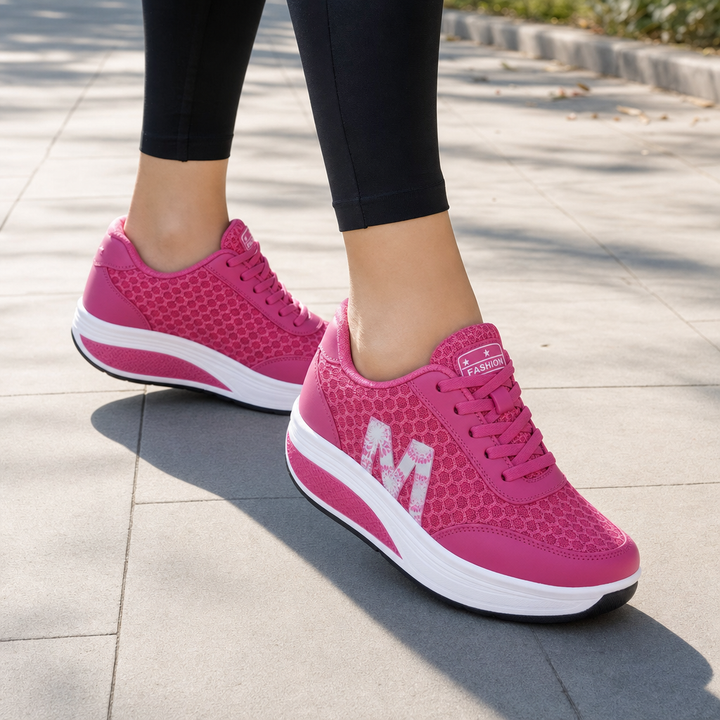 Breathable women's orthopedic sneakers for walking & active lifestyles, featuring excellent arch support.