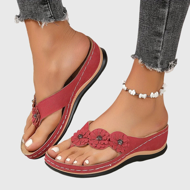 Ergonomic women's orthopedic sandals with strong arch support & shock absorption for foot pain relief.