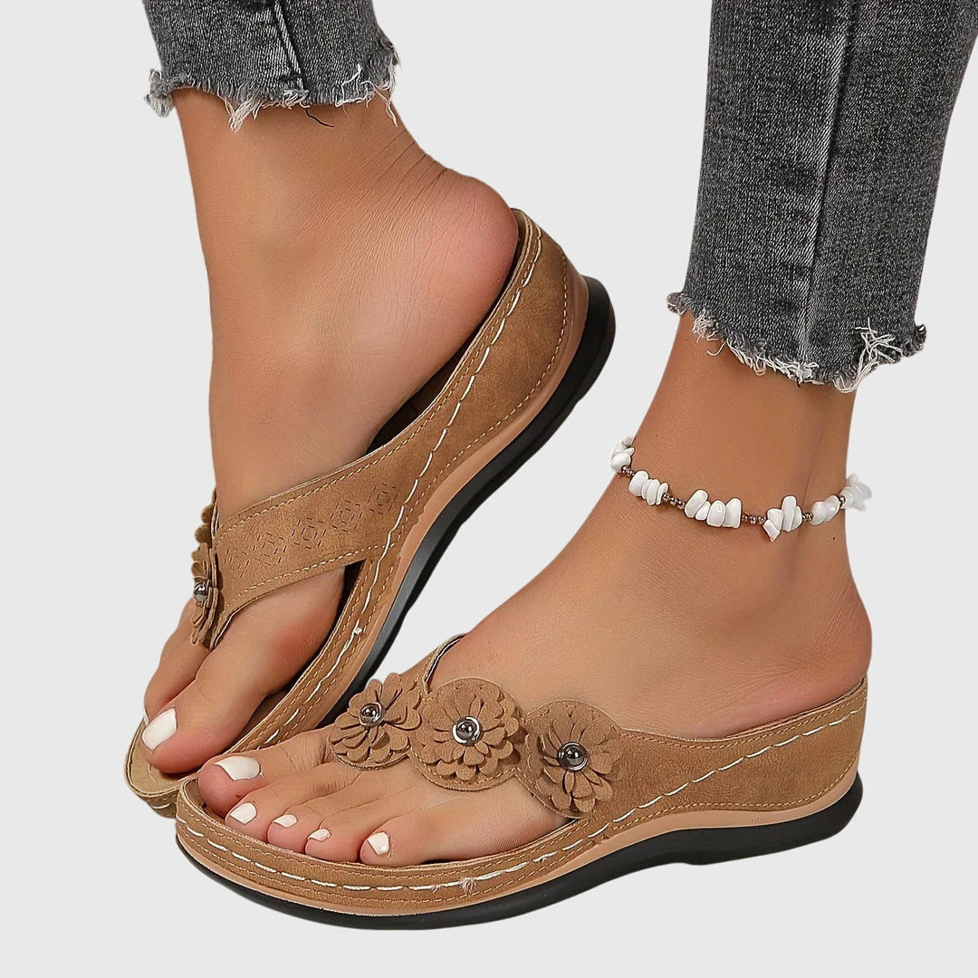 Comfortable women's orthopedic footwear, these flip flops offer excellent arch support for all-day wear.