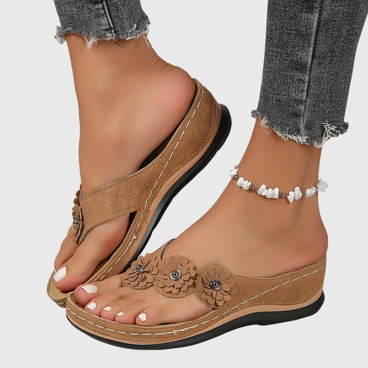 Comfortable women's orthopedic footwear, these flip flops offer excellent arch support for all-day wear.