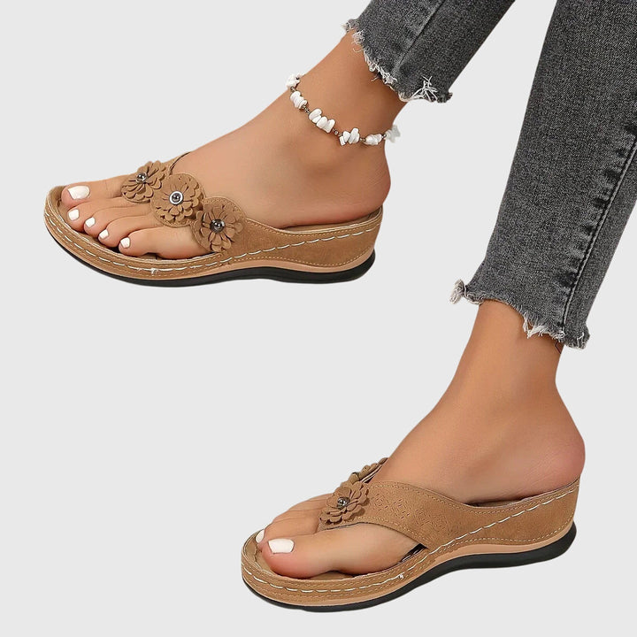 Modern women's orthopedic flip flops featuring ergonomic design & superior arch support for ultimate comfort.