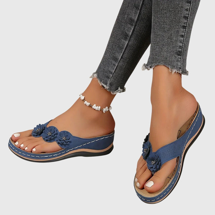 All-day comfort women's flip flops. Orthopedic design, arch support & shock absorption for summer & casual activities.