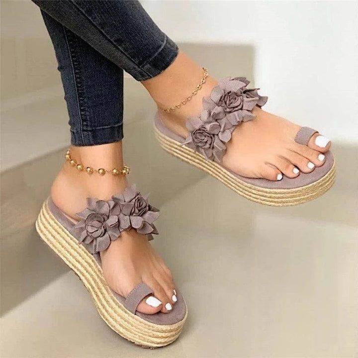 Comfortable women's floral summer sandals with adjustable straps and arch support, perfect for everyday pain relief.