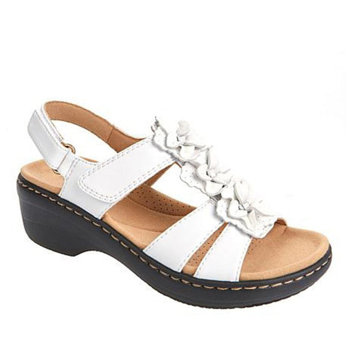 Stylish women's orthopedic sandals, gladiator silhouette, charming floral design, durable wedge for support