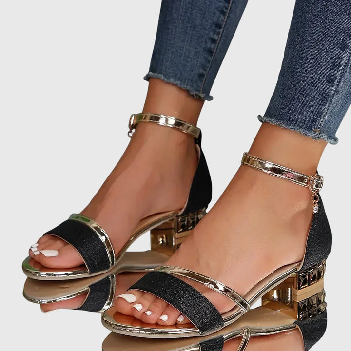 Stylish women's heeled orthopedic sandals with ergonomic design & adjustable strap for posture support.