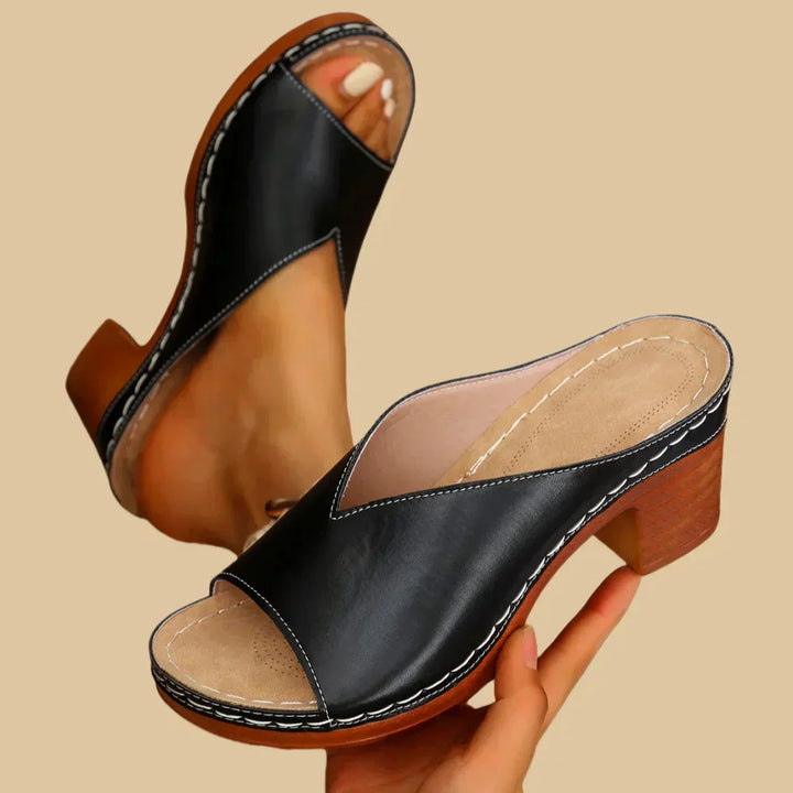 Comfortable women's orthopedic walking sandals with a thick supportive block heel for long-lasting wear.