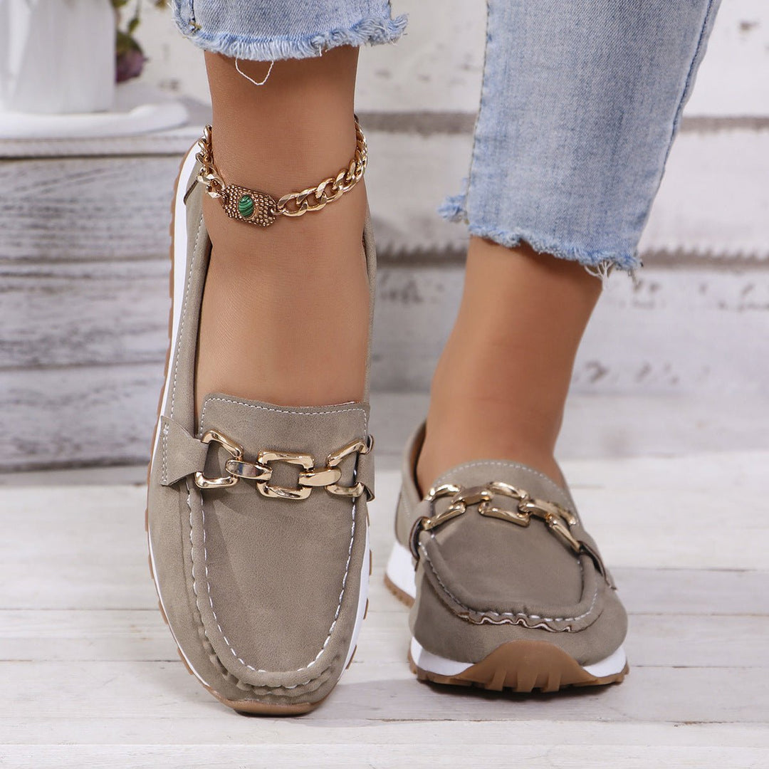 Orthopedic women's casual loafers, designed with arch support for comfortable walking.