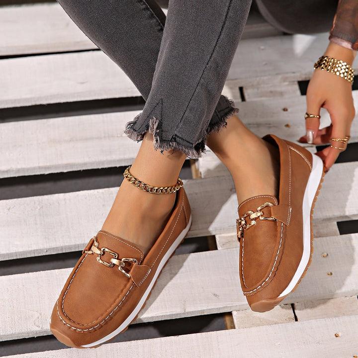 Slip-on women's walking shoes, orthopedic design with enhanced arch support for active comfort.