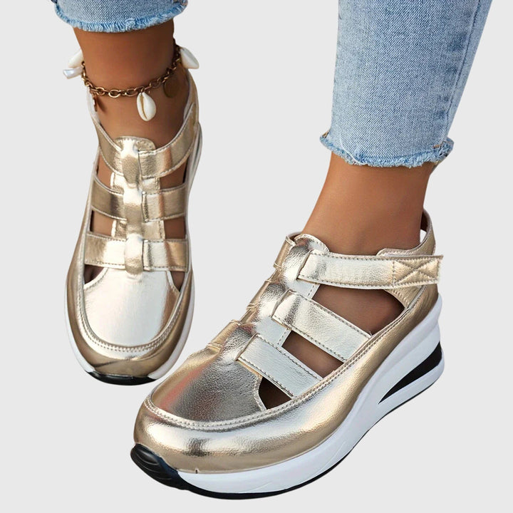 Premium women's orthopedic footwear, adjustable arch support, durable & stylish comfort sandals.