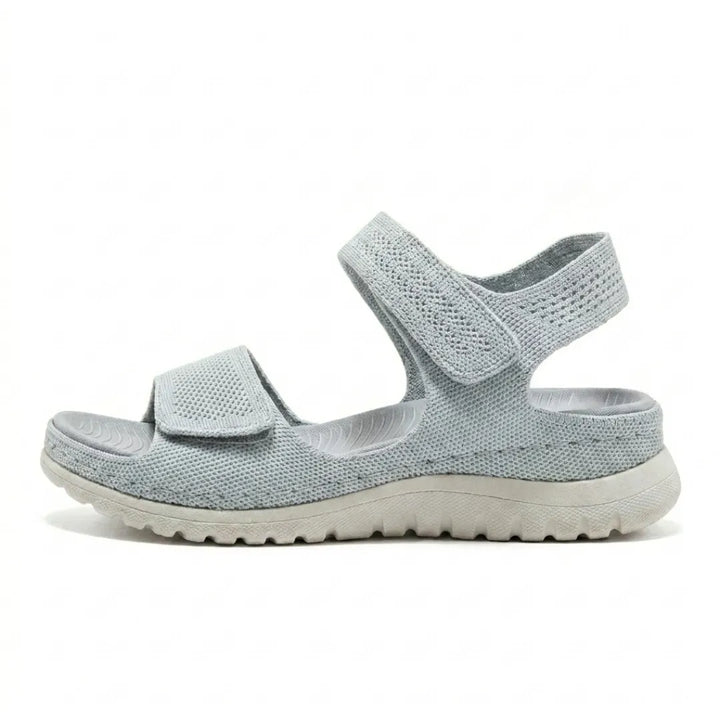 Women's orthopedic comfort sandals with adjustable hook-and-loop straps.