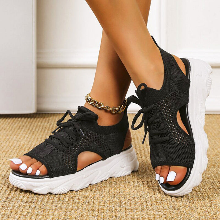 Cushioned orthopedic sandals for women, featuring adjustable straps & excellent arch support for all-day comfort.