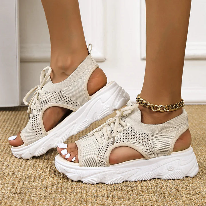 Women's footwear: Orthopedic sandals offering cushioned foot support & adjustable straps for comfortable, everyday wear.