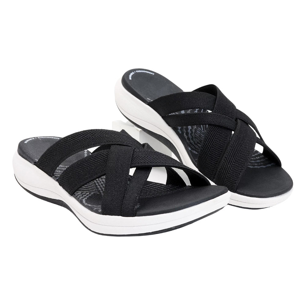 Women's orthopedic sandals with arch support for comfortable all-day wear, reducing foot fatigue.