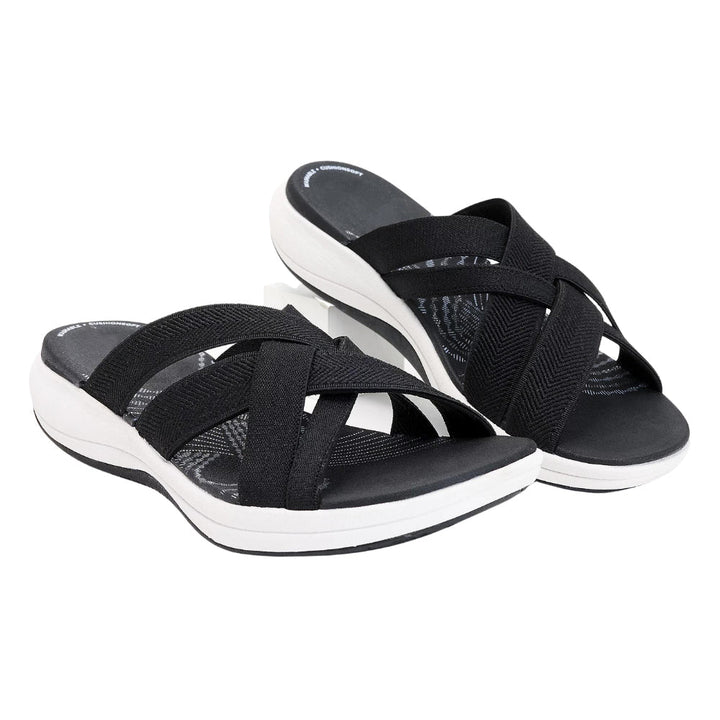 Women's orthopedic sandals with arch support for comfortable all-day wear, reducing foot fatigue.