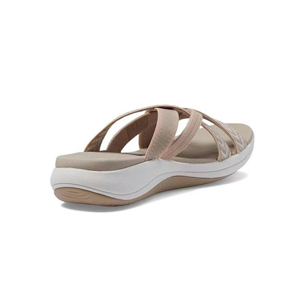 Chic women's casual sandals blending modern style with orthopedic arch support for active wear.