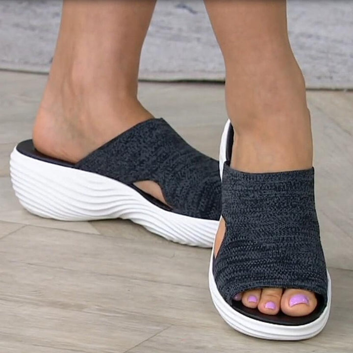 Casual slip-on women's sandals, ideal for summer daily wear & foot comfort.
