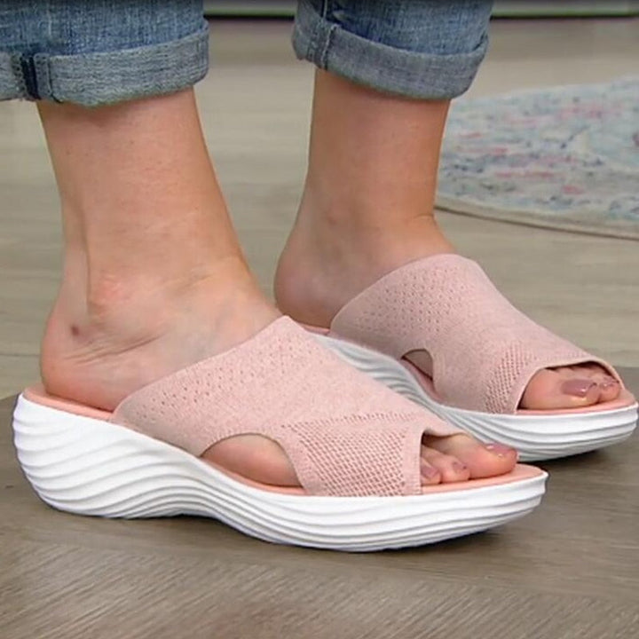 Slip-on comfort sandals for women, promoting foot health with orthopedic arch support.