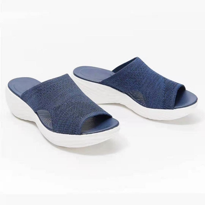 Ergonomic women's sandals with arch support, providing ultimate comfort & pain relief.