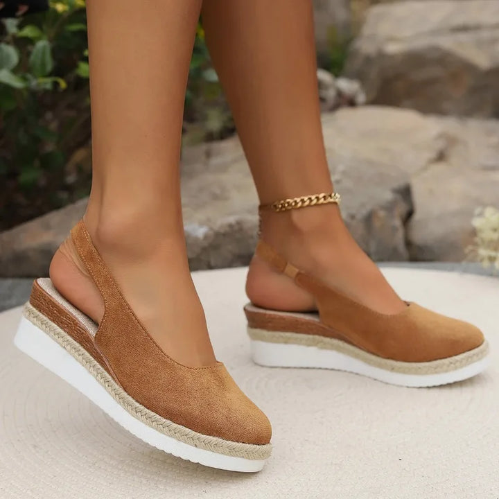 Women's orthopedic sandals with arch support for superior foot comfort, ideal for everyday wear and walking.