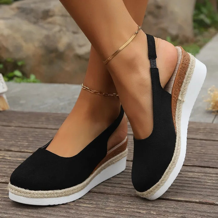 Woman wearing beige orthopedic walking sandals, perfect for daily errands & providing excellent foot support.