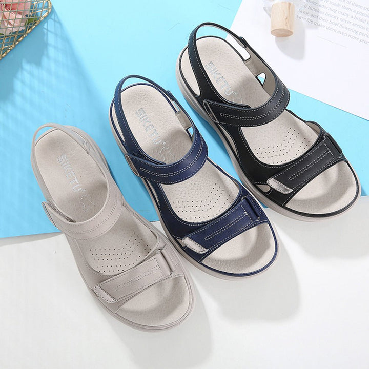 Ladies' comfortable footwear: arch support sandals providing orthopedic benefits & improved posture.