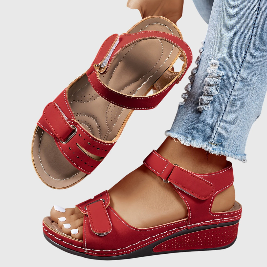 Women's orthopedic sandals with crystal embellishments, offering arch support & everyday comfort.
