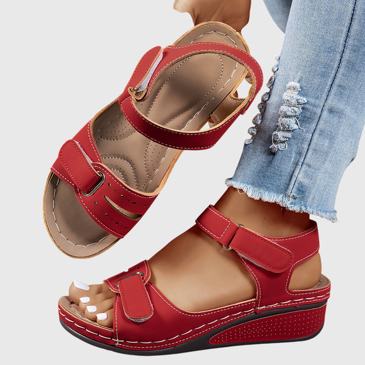 Women's orthopedic sandals with crystal embellishments, offering arch support & everyday comfort.