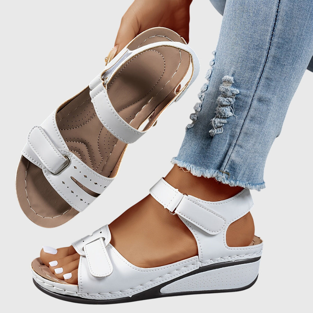 Elegant women's crystal sandals offering orthopedic comfort, stretch fit, and vital arch support for daily wear.