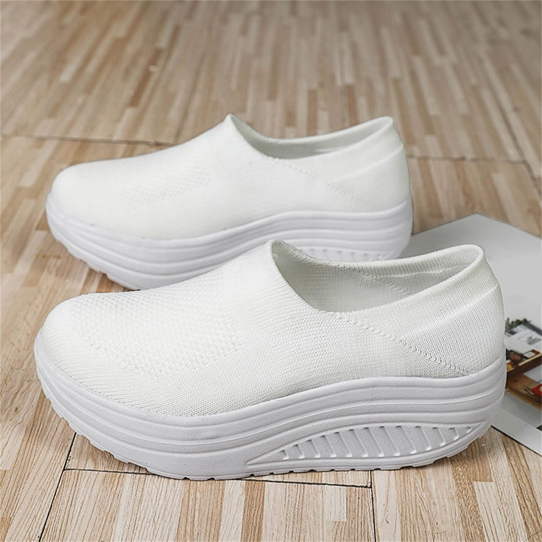 Ergonomic women's orthopedic slides, providing superior arch support for comfortable walking & daily wear.