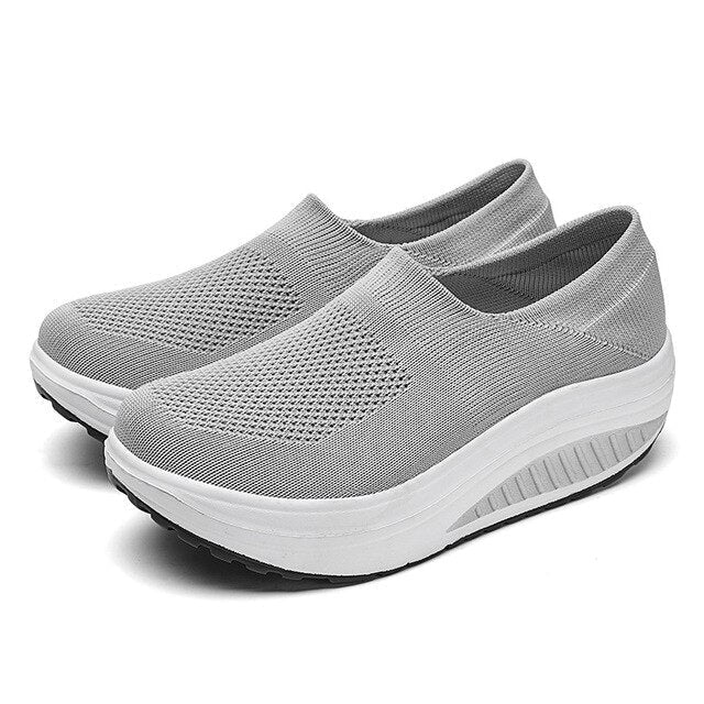 Stylish women's slip-on slides, offering orthopedic arch support & cushioned comfort for everyday wear.