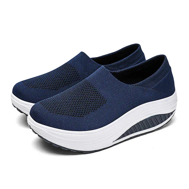 All-day comfort women's slides with essential orthopedic arch support and a soft cushioned footbed.