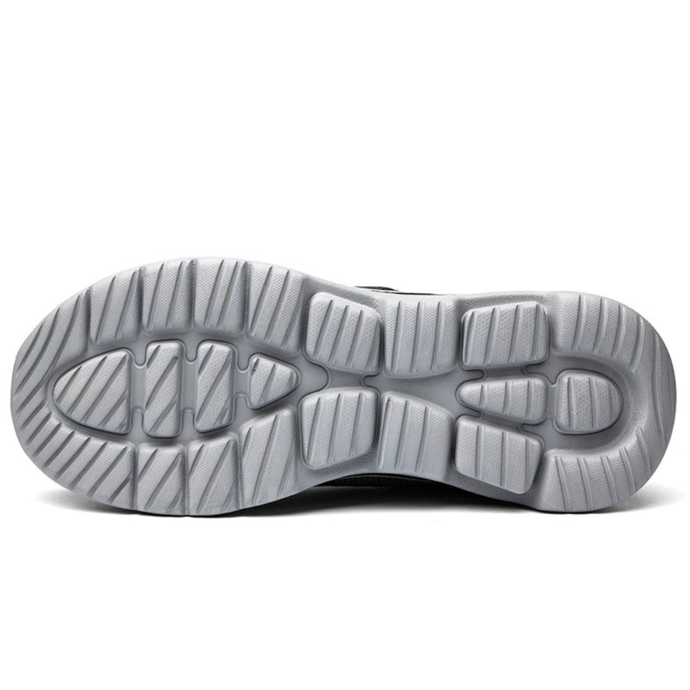 Side view of women's orthopedic slip-on shoes, showing adjustable wide fit for maximum foot relief.