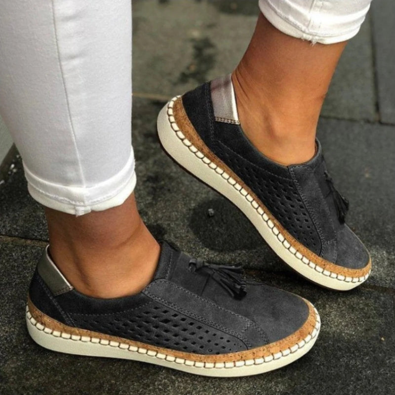 Comfortable women's orthopedic walking shoes. Slip-on design with arch support & non-slip sole for stability.