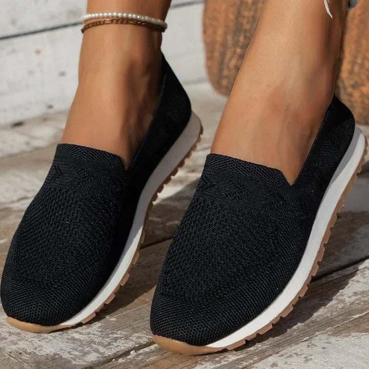 Orthopedic women's slip-ons with a breathable mesh upper, providing all-day comfort and foot support.