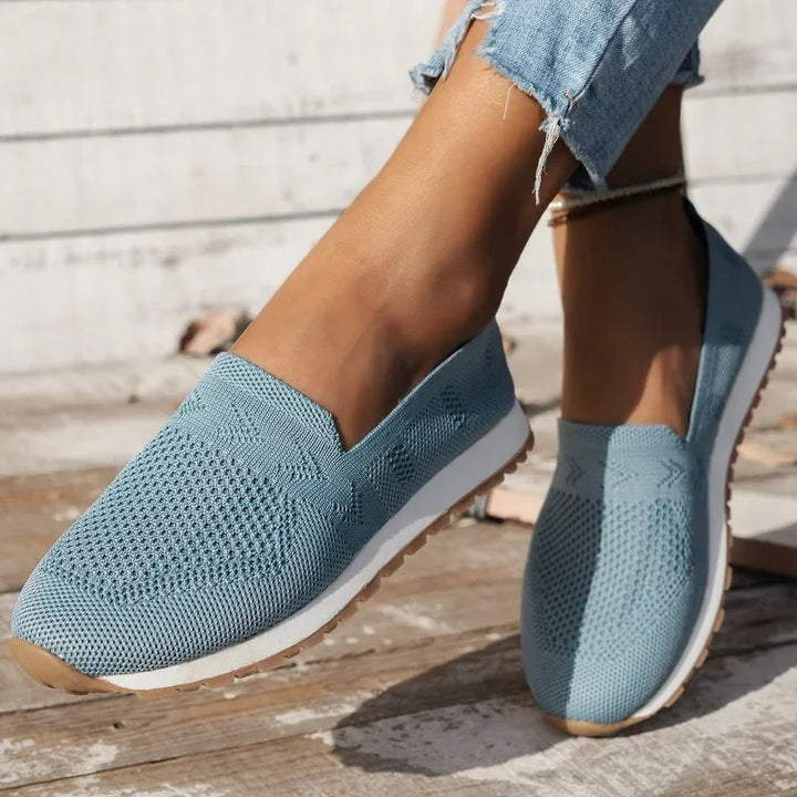 Lightweight orthopedic slip-on shoes for women, designed with breathable mesh for ultimate walking comfort.