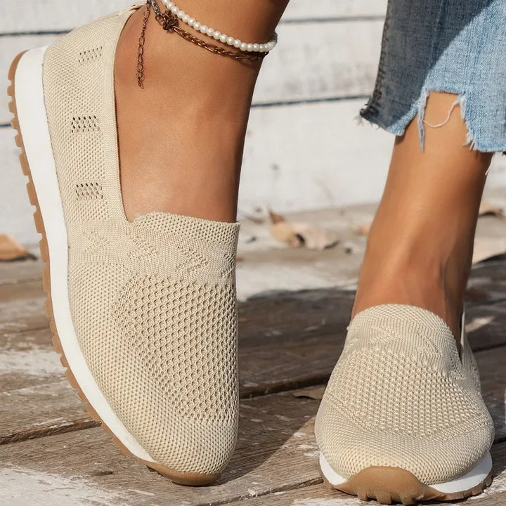 Casual ladies' slip-on shoes, orthopedic support & breathable mesh for comfortable daily wear.