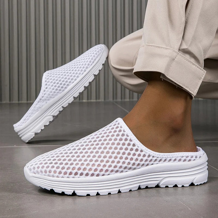 Women's orthopedic slip-on sneakers with essential arch support for comfortable everyday walking.