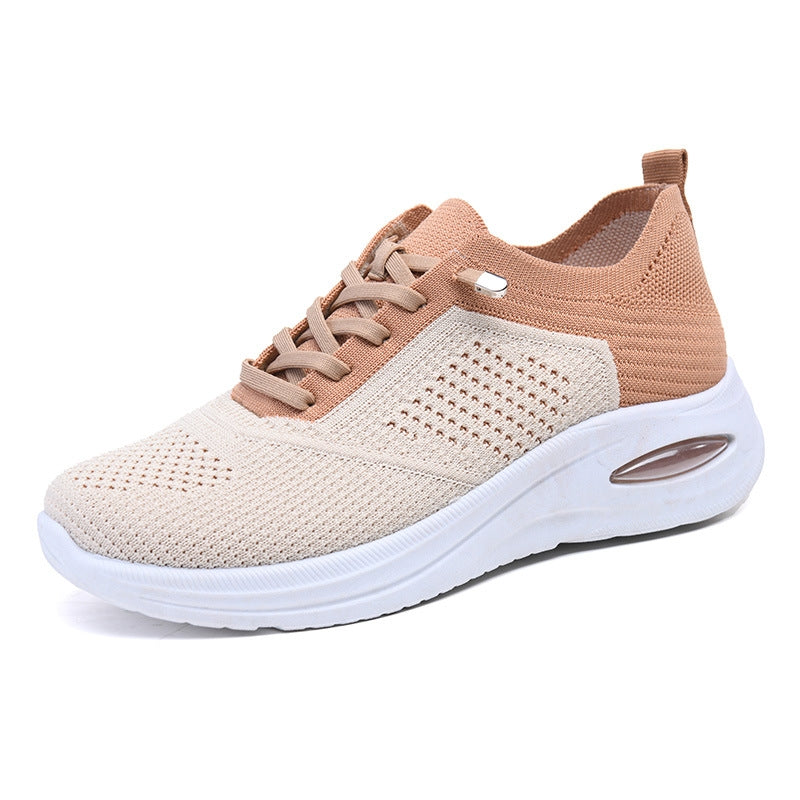 Lightweight women's slip-on walking shoes with breathable mesh upper, perfect for casual everyday comfort.